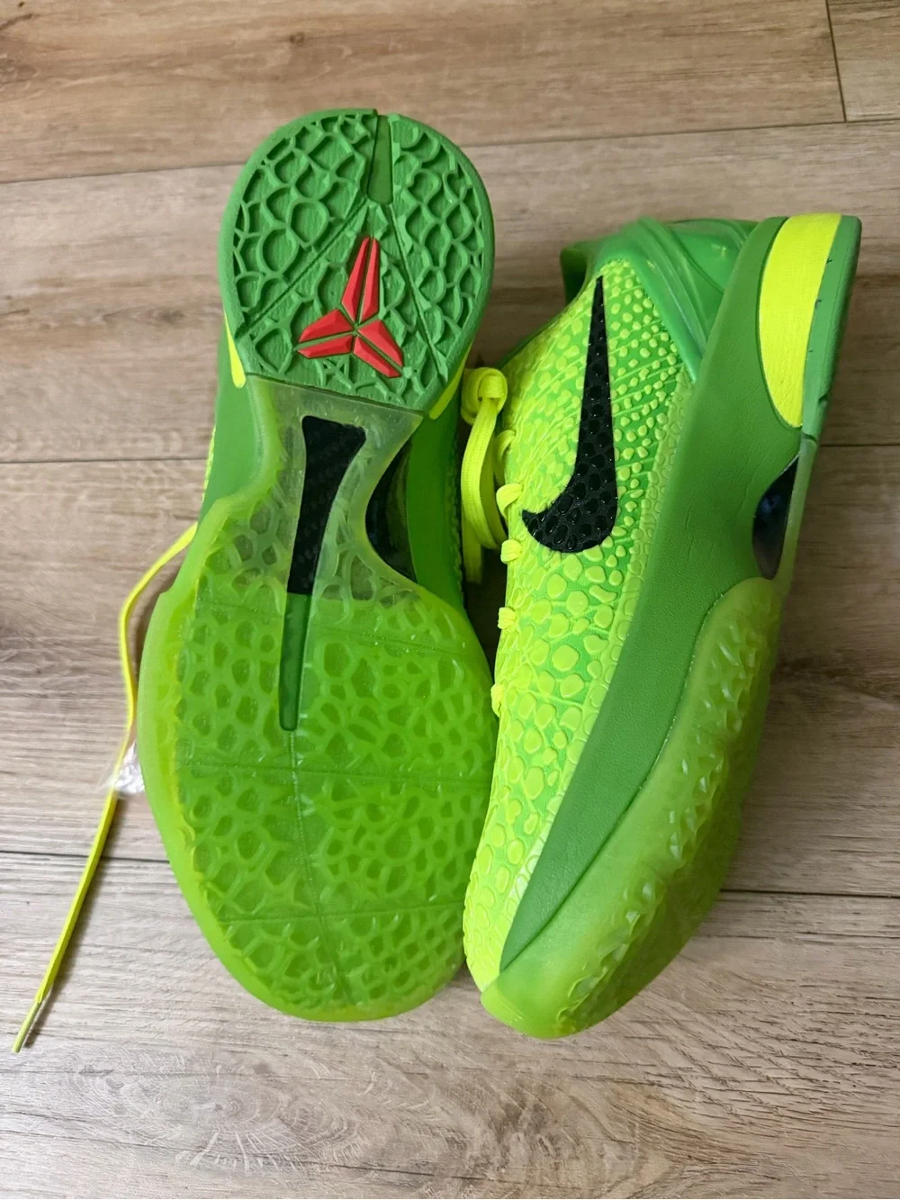Nike Kids Bright Neon Green Athletic Sneakers with Extra Red Laces its new